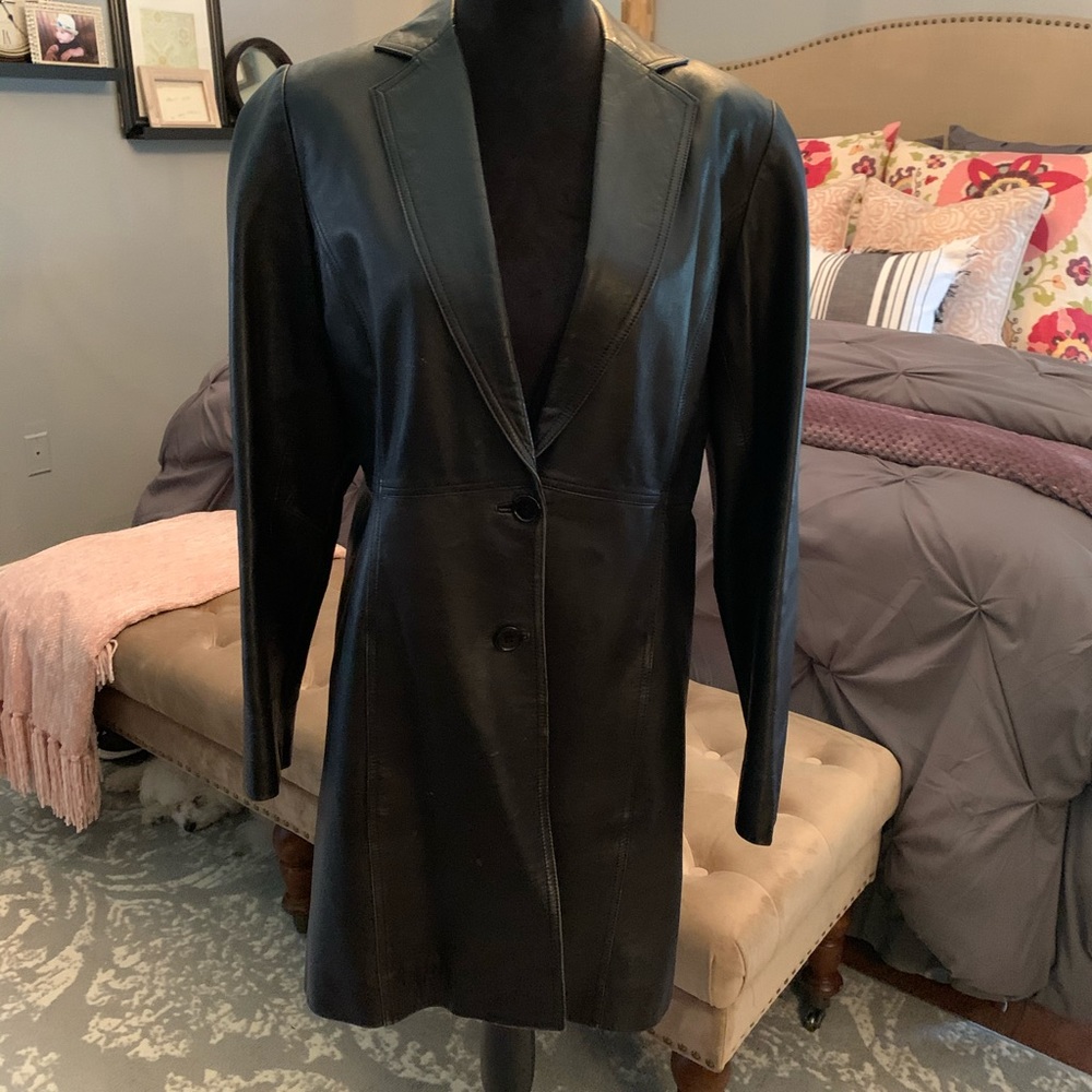 100% leather jacket...length- top of knee